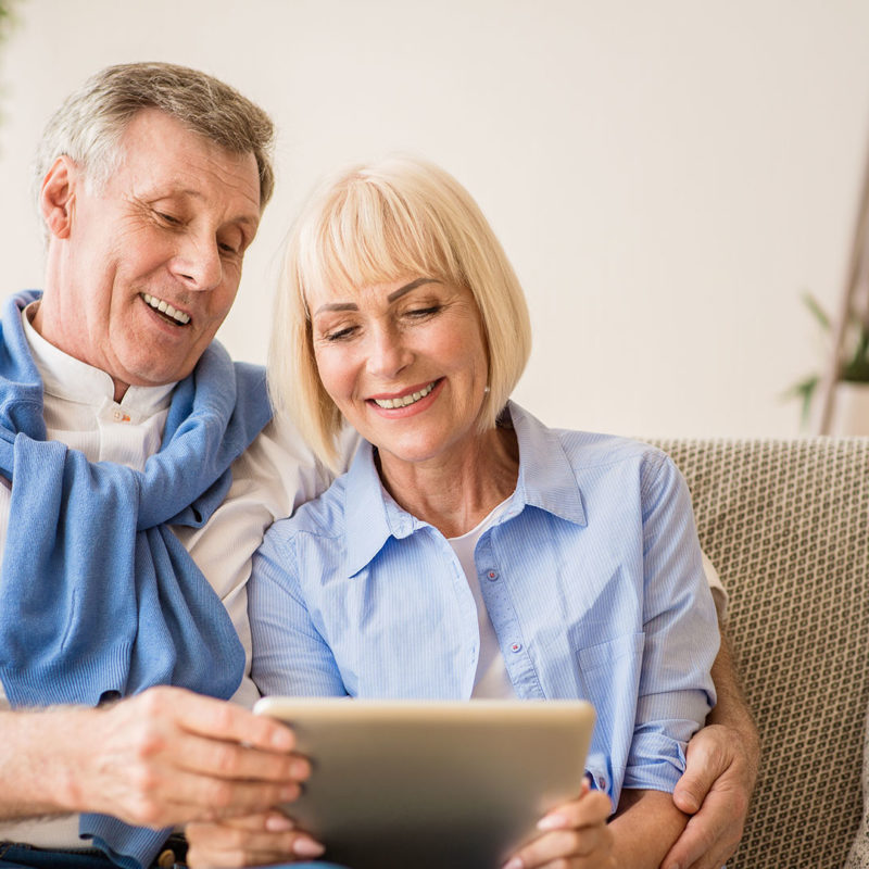 Old Couple on iPad Background