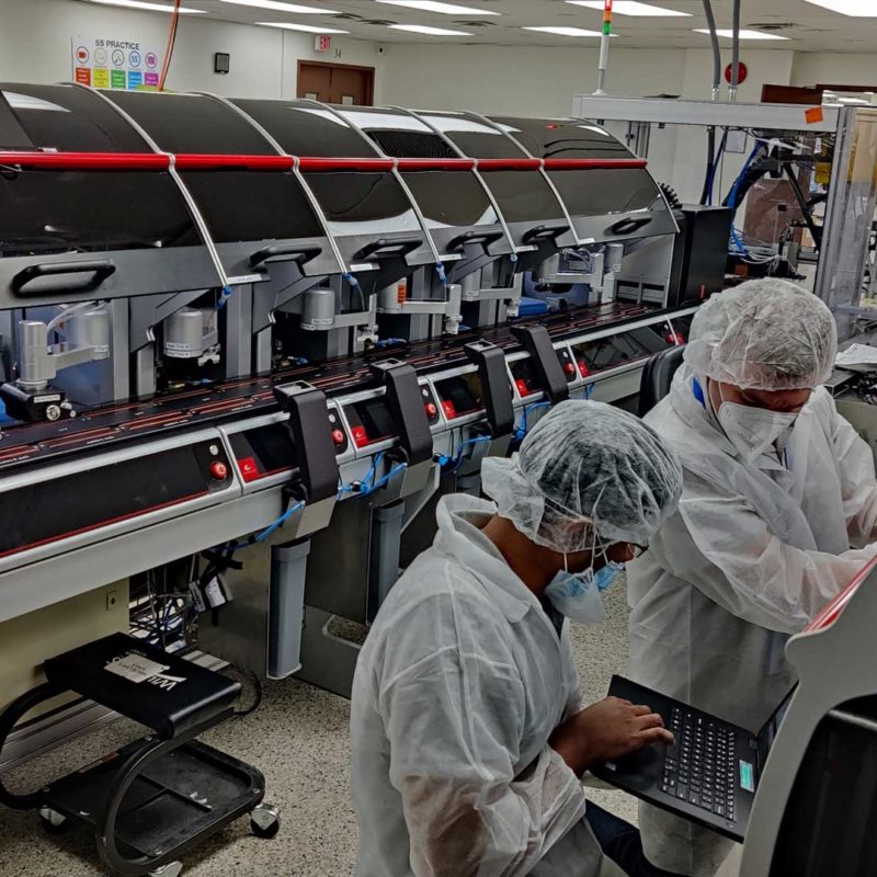 Chembio Employees Working in the Lab